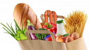 Paper bag with food on a white background.